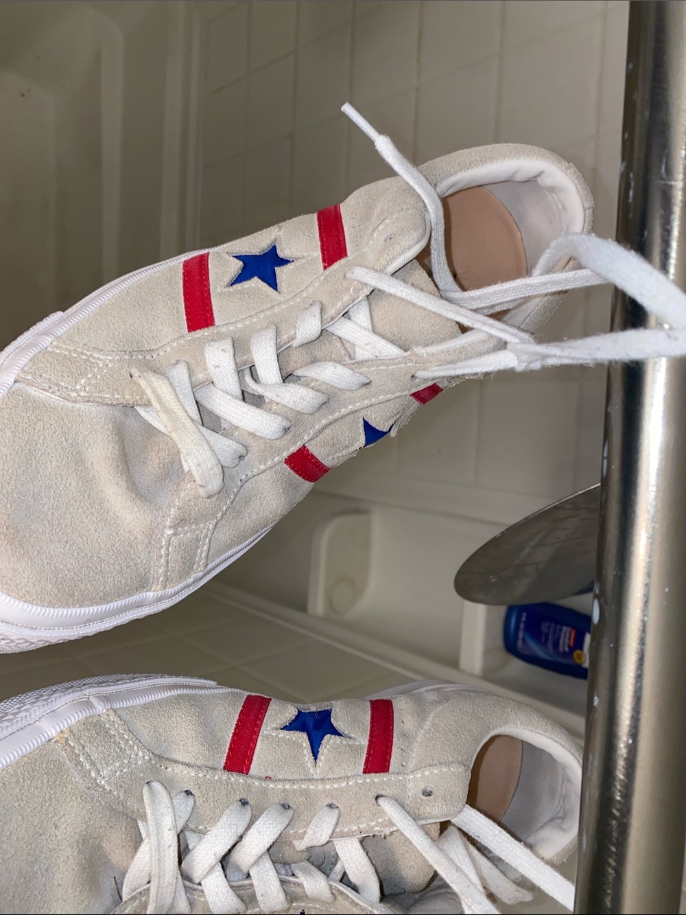 Beige Suede Sneakers with Red Stripes and Blue Star Detail